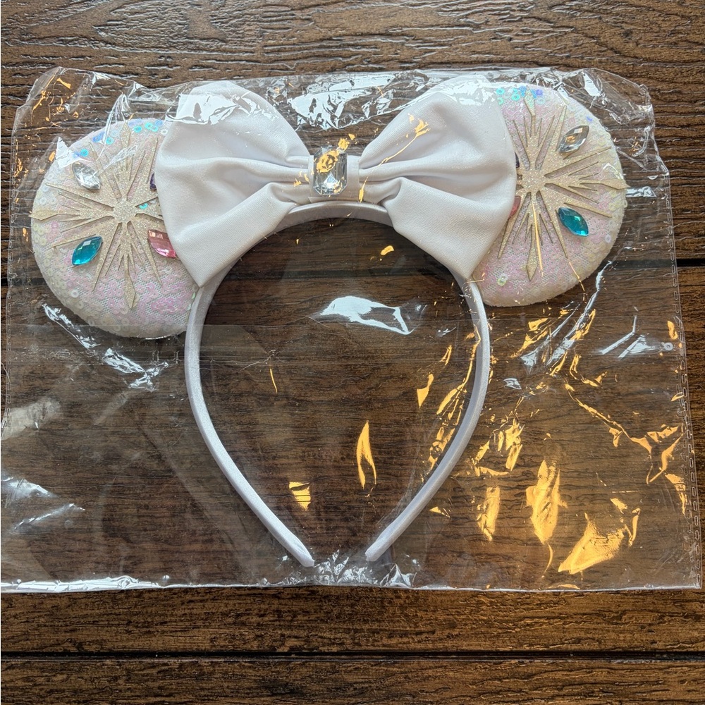 Frozen inspired Minnie ears new in plastic